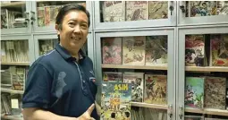  ?? DEBORA DANISA SITANGGANG/JAWA POS ?? HASIL PERBURUAN: Andy Wijaya di antara koleksi komik yang disimpan di kantornya, Bumilangit Corpora, di Jakarta Selatan. Total koleksi komiknya sekitar 50 ribu jilid yang dikumpulka­n sejak 2004.