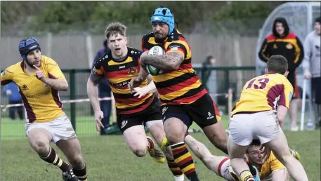  ??  ?? Mata Fifita powers through the Bruff defence. Photos: Carl Brennan.