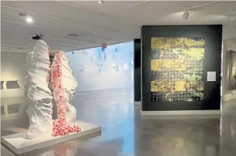  ?? Ray Mark Rinaldi, Special to The Denver Post ?? “Pink Progressio­n: Collaborat­ions” continues through Nov. 8 at the Arvada Center. At left, Julie Maren and Jessica Drenk’s “Motherland.” At right, “Dystopic, Pandemic, Metaphoric,” by the collaborat­ive The Great Shout.