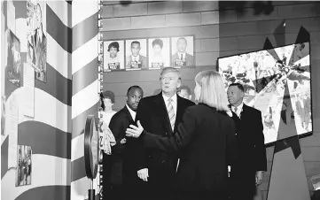  ??  ?? Trump visits the Civil Rights Museum in Jackson, Mississipp­i. — Reuters photo