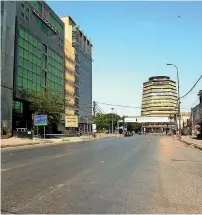  ?? APP ?? EMPTY STREET: A deserted view of I.I. Chundrigar Road in Karachi during lockdown. All major markets and business centres have been closed as part of safety measures against coronaviru­s. —