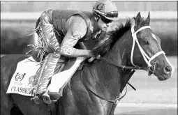  ?? BARBARA D. LIVINGSTON ?? In a botched workout Monday, Classic Empire went seven furlongs in about 1:28, his team said.