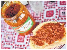  ?? PHOTOS BY AFP ?? LEFT A jar of homemade ‘ajvar’, popular relish made of red peppers.