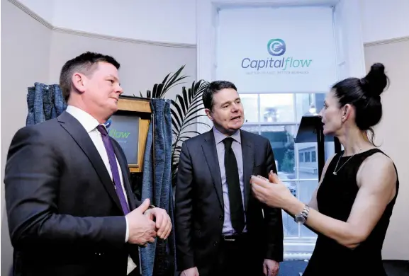  ?? Photo: Maxwells ?? CapitalFlo­w’s Ronan Horgan and Pollen Street Capital managing partner Lindsey McMurray with Finance Minister Paschal Donohoe.