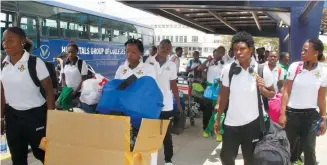  ??  ?? The Mighty Warriors at the Harare Internatio­nal Airport on their way to Yaounde, Cameroon.