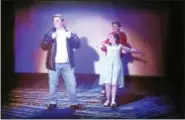  ??  ?? Mickey Gray (Conrad Birdie), Sarah Lala (Kim MacAfee), and Ben Daniels (Hugo Peabody) in a scene from “Bye Bye Birdie.”