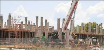  ?? Doug Walker / Rome News-Tribune ?? Second-floor supports are going up rapidly on the new Courtyard by Marriott on West Third Street. The hotel will receive more than $2.5 million in tax allocation district financial assistance over 12 years.