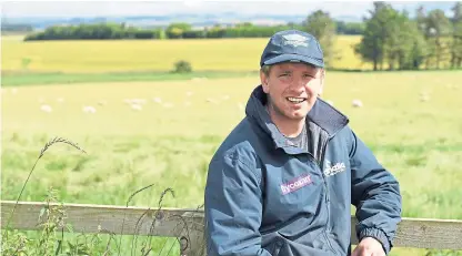  ??  ?? Gary Bruce says he gained valuable guidance on the grading of lambs.