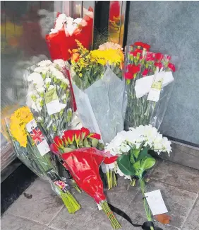  ??  ?? Tribute Local people left flowers outside the city centre shop doorway where the man slept following his death in February
