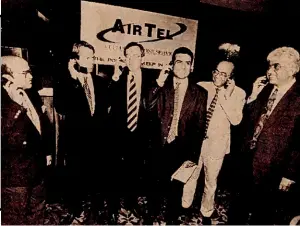  ??  ?? RINGING IN CHANGE Sunil Mittal (third from right) at the launch of the Airtel service in Delhi