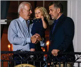  ?? (The Washington Post/Demetrius Freeman) ?? President Joe Biden spends time with son Hunter Biden and grandson Beau Biden during the Fourth of July celebratio­n at the White House earlier this year.