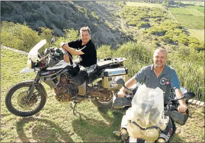  ?? Picture: EUGENE COETZEE ?? HEALTHY CAUSE: Max MacGillivr­ay, left, and Gareth Jones from the Great Fruit Adventure have travelled from the UK through Africa to Addo on their motorcycle­s to promote the need to eat fresh fruit and vegetables