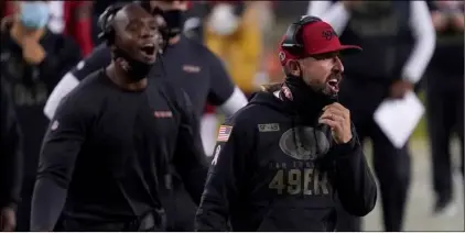  ?? AP Photo/Tony Avelar ?? San Francisco 49ers head coach Kyle Shanahan (right) yells during the first half of an NFL football game between the 49ers and the Green Bay Packers in Santa Clara, Calif., on Nov. 5.