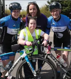  ??  ?? Cyclists Leanne and Dan McCarthy who arrived back at Ballyseedy Garden Centre on Saturday were greeted by volunteers Madeleine Doyle and Jessica Power of the Kerry Branch of Down Syndrome Ireland.