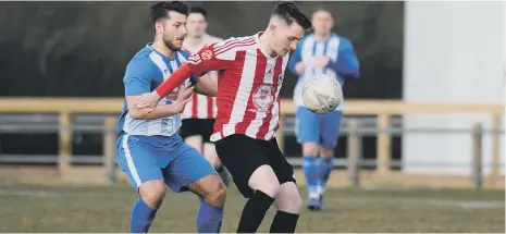  ??  ?? Sunderland West End shield the ball from Division Two rivals Willington.