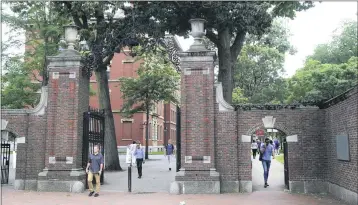  ?? CHARLES KRUPA — THE ASSOCIATED PRESS FILE ?? Harvard University is among the colleges suing the Trump administra­tion over its decision to bar internatio­nal students from staying in the U.S. if they take classes entirely online this fall.