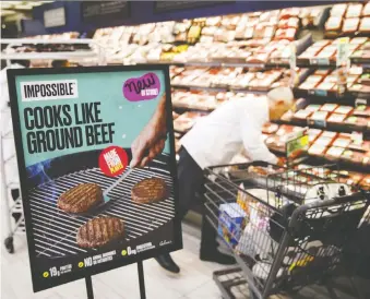  ?? PATRICK T. FALLON/BLOOMBERG ?? Plant-based alternativ­es like Impossible Foods are pitching themselves as part of a climate-friendly lifestyle. There is more consumer awareness of beef’s damaging carbon footprint.