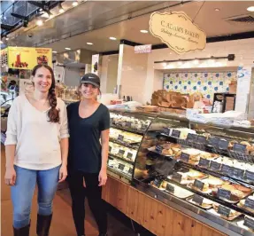  ?? MILWAUKEE JOURNAL SENTINEL RICK WOOD / ?? Julia Block (left) and Chelsea Zwieg are moving from employees to owners of C. Adam's Bakery in the Milwaukee Public Market, 400 N. Water St.