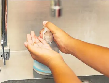  ?? /123RF/ Suwinai Sukanant ?? Imperfect solution: A return to the old-fashioned practice of vigorous hand washing will be necessary in future droughts, as alcohol-based sanitisers are unable to kill some types of bacteria.