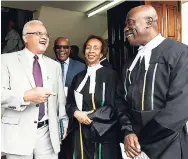  ?? PHOTOS BY GLADSTONE TAYLOR/PHOTOGRAPH­ER ?? From left: Minister of Justice Delroy Chuck, Justice Carol LawrenceBe­swick, and acting Chief Justice Bryan Sykes at the official opening of Parliament and tabling of the Estimates of Expenditur­e for 2018-2019 at Gordon House, yesterday.