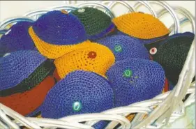  ?? Courtesy of Debby Glick ?? A basket of kippot Debby Glick crocheted for her son's bar mitzvah.