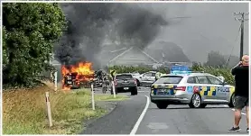  ?? ?? Left: A car on fire at a crash near Eureka in the Waikato.