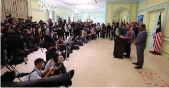  ?? — Bernama photo ?? Anwar addresses the press after chairing the special meeting of the 2022 National Action Council on the Cost of Living.