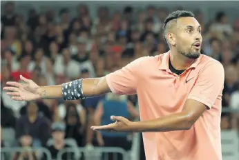  ?? MIKE OWEN/GETTY IMAGES ?? Nick Kyrgios argues with the chair umpire during his third-round match against Karen Khachanov of Russia at Melbourne Park. Kyrgios won a five-setter, capped by an extended tiebreak, to earn a chance against No. 1 Rafael Nadal.