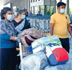  ??  ?? HOMEBOUND: Since the pandemic struck, thousands of stranded residents and visitors had been repatriate­d, thanks to missions and other government entities. The GDRFA in Dubai helped 1,600 people fly home since June.