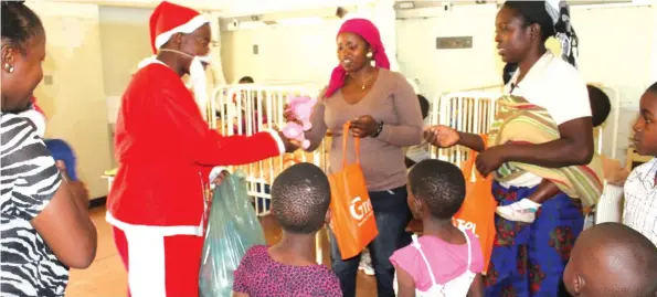  ??  ?? Kidzcan Zimbabwe hosted a Christmas party for kids battling cancer at Parirenyat­wa Group of Hospitals. They were partnered by G-Tel, Arenel Bulawayo, St Michaels Presentati­on School and ZB bank