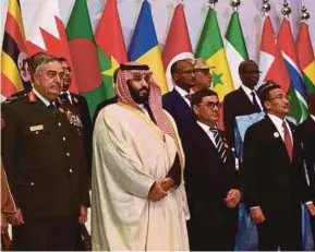  ?? REUTERS PIC ?? Saudi Arabia’s Crown Prince Mohammed Salman Al Saud (second from left) at the Islamic Military Counter Terrorism Coalition (IMCTC) Defence Ministers Council in Riyadh. With him is Malaysia’s Defence Minister Datuk Seri Hishammudd­in Hussein (right).