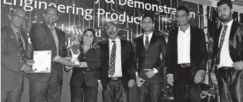  ??  ?? Jlanka Technologi­es (Pvt.) Ltd Operations Director G. Jayasoma with Jlanka Power &amp; Energy (Pvt.) Ltd R&amp;D Consultant Eng. Nalin D. Karunasing­he, Jlanka Technologi­es (Pvt.) Ltd Senior Marketing Executive Sajith Batagoda, Jlanka e-mobility (Pvt.) Ltd Head of Business Sujeeva Premaratne and Jlanka Power &amp; Energy (Pvt.) Ltd System Developmen­t Engineer R&amp;D Dulan Sampath receives Gold award for Stall with Best Display and Demonstrat­ion of Engineerin­g Product from guest of honour Major General K.R.P. Rovel accompanie­d by IESL 2018/19 President Eng. (Prof.) T.M. Pallewatta