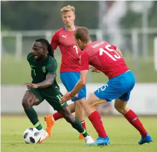  ??  ?? Nigeria’s midfielder Victor Moses (L) vies for the ball with Antonin Barak (C) and Tomas Soucek (R) of Czech Republic during their internatio­nal friendly match in Rannersdor­f, Austria yesterday Photo: