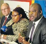 ??  ?? HAVING THEIR SAY: Mayor Athol Trollip and councillor­s Siyasanga Sijadu and Nqaba Bhanga address the media