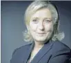  ?? Eric Feferberg AFP/Getty Images ?? MARINE Le Pen and Emmanuel Macron, below, will face off in the presidenti­al runoff.