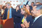  ?? GREG SORBER/JOURNAL ?? City Councilor-elect Cynthia Borrego, center, celebrates the results of the runoff election Tuesday with Mayor-elect Tim Keller, left, and Bernalillo County Sheriff Manuel Gonzales III, right, at the Hotel Andaluz in Albuquerqu­e.