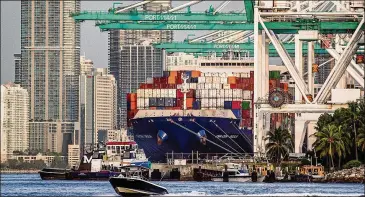  ?? SCOTT MCINTYRE/THE NEW YORK TIMES ?? A container ship on Aug. 25 at port in Miami Beach, Fla. Shipping is at the center of what has gone awry in the global economy.