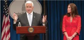 ??  ?? Pennsylvan­ia Gov. Tom Corbett and and state Attorney General Kathleen Kane announce terms of UPMC’s split with Highmark.