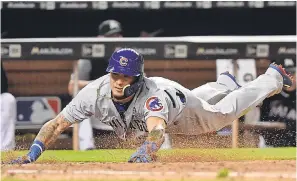  ??  ?? Javier Baez became the latest Cubs player to settle down and get engaged or married. STEVE MITCHELL/USA TODAY SPORTS