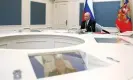  ?? Photograph: SPUTNIK/Reuters ?? President Putin inspects the exercise to test delivering a massive retaliator­y nuclear strike, via video link from Moscow.