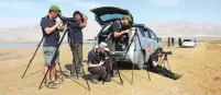  ?? (Dov Greenblat) ?? A BIRD-WATCHING team looks for bird species in the Arava on Tuesday as part of the ‘Champions of the Flyway’ fund-raising event.