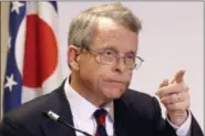  ?? KEITH SRAKOCIC — THE ASSOCIATED PRESS FILE ?? Ohio Attorney General Mike DeWine is shown in this photo. In the wake of the catastroph­ic flooding in Texas, DeWine is sending out advice to Ohioans so they can make wise charitable contributi­ons.