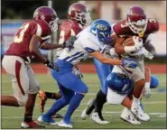  ?? TANIA BARRICKLO — DAILY FREEMAN FILE ?? Charles Robinson carries the ball during Kingston’s season opener earlier this month.