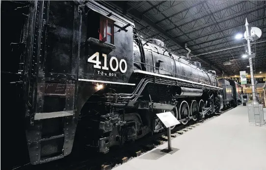  ?? PHOTOS: ALLEN McINNIS ?? The Exporail exhibit Iron and Ice: Snow Trains, on until May 20, includes a steam-powered locomotive that once pushed a 224,000-pound (110-ton) rotary snowplow methodical­ly down the track, since the snowplow could not propel itself forward.