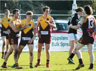  ??  ?? Jackson Kos (3rd from left) is congratula­ted by Drouin team mates, from left, Liam Anderson, Eddie Morris, Bailey Beck and Will Collins after the second of his goals in the second quarter against Wonthaggi on Saturday. PHOTOGRAPH: Amanda Emary.