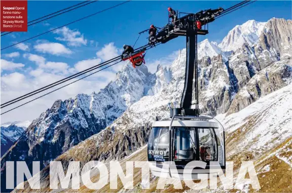  ?? (Ansa) ?? Sospesi Operai fanno manutenzio­ne sulla Skyway Monte Bianco