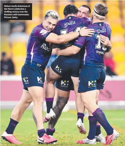  ??  ?? Nelson Asofa-Solomona of the Storm celebrates a thrilling victory over the Roosters with teammates. Picture: Getty