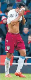  ?? Photo: REUTERS ?? Thrashed: Aston Villa’s Kieran Richardson reacts after losing 5-0 to Arsenal in their English Premier League football match at the Emirates Stadium yesterday.