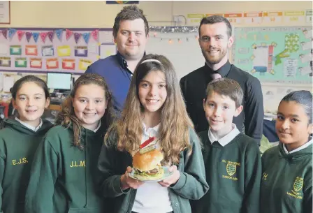  ??  ?? Hill View Academy pupil Abigail Dobson, 10, healthy burger winner with runner-ups and , back, left, John Stirk and head waiter Darryl Howard.
