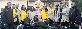  ?? PHOTO BY COLLIN REID, COURTESY OF JAMAICA OLYMPIC ASSOCIATIO­N ?? Members of Jamaica’s Youth Olympic team and staff who arrived in Buenos Aires, Argentina, on Tuesday, October 2. They were met by the Youth Olympic Games mascot Pandi.